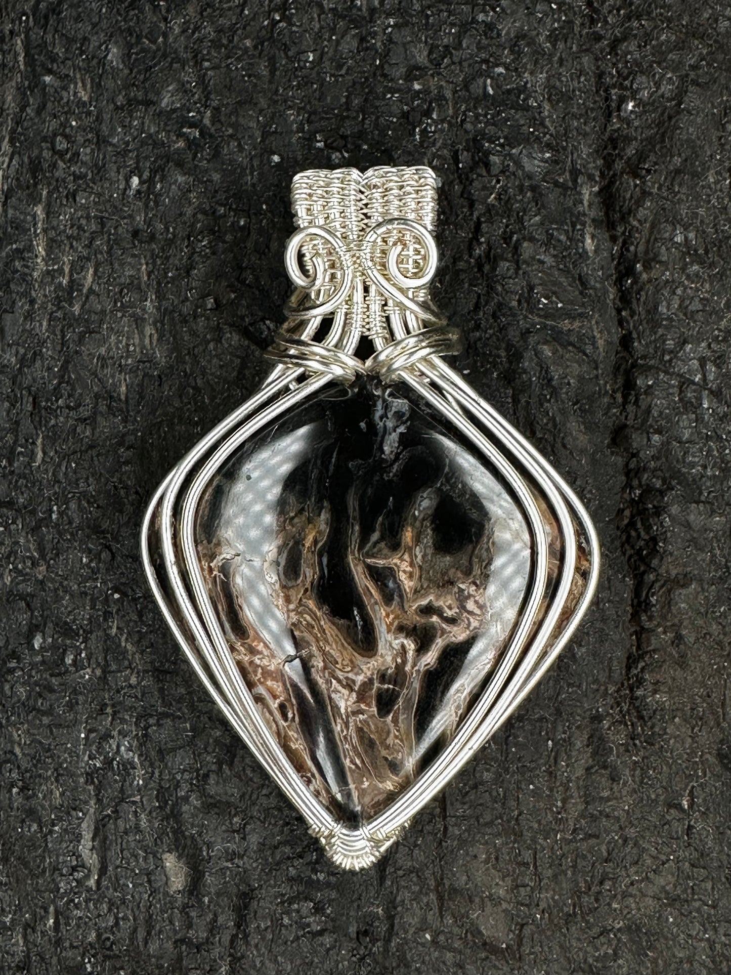 FP-02 The Legacy natural Fossil Palm Root pendant in handwoven silver